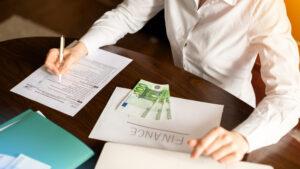 Woman working with finances on the table